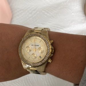 MK gold tortoise watch